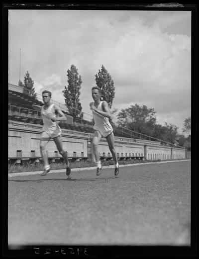 University of Kentucky Track Team (1939 Kentuckian), two team members running