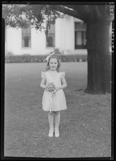 St. Joseph's Hospital, 544 West Second (2nd) Street; graduation exercises (nurses), young girl posing in front of a tree