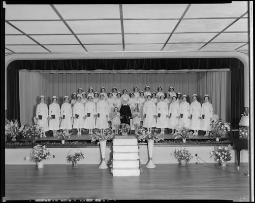 St. Joseph's Hospital, 544 West Second (2nd) Street; graduation exercises (nurses), nurses posing on auditorium stage