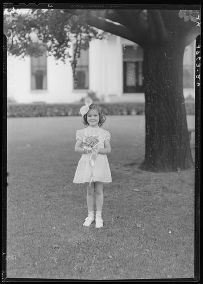 St. Joseph's Hospital, 544 West Second (2nd) Street; graduation exercises (nurses), young girl posing in front of a tree
