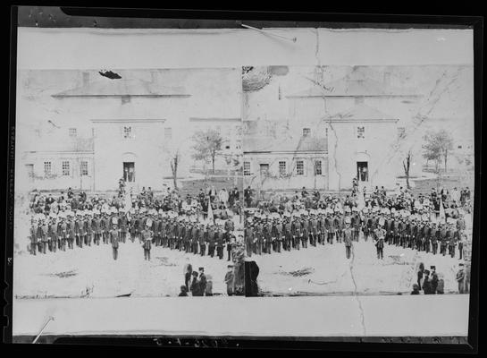 Lexington Views; copy print, uniformed members on parade in front of building