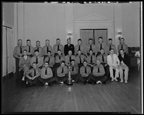Southeastern Greyhound Lines; bus drivers, group posing with trophy