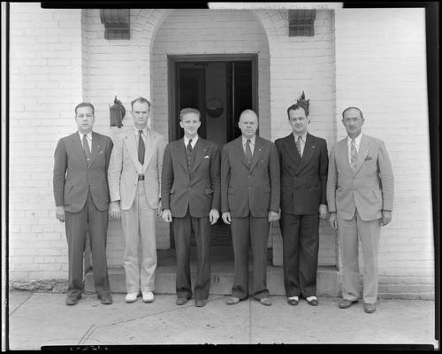 Bluegrass Automobile Club; group of men standing outside exterior of building
