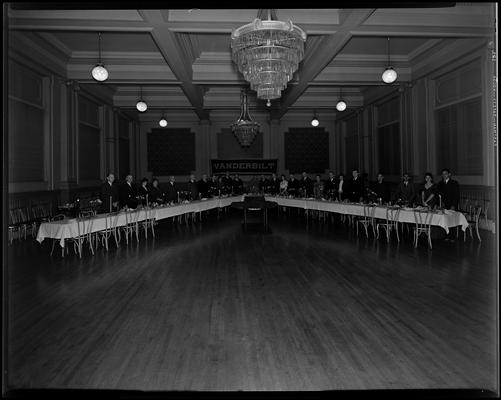 Mr. Turner (Tanner?); Vanderbilt banquet; people standing at dinner tables in ballroom