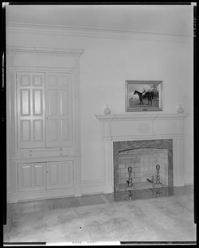 Leslie Combs; interior of home, fireplace (close-up)