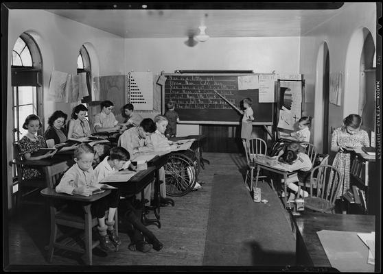 Kentucky Society for Crippled Children; school, children of various ages studying in classroom