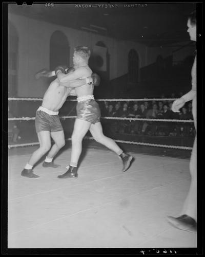 Boxing; (1939 Kentuckian) (University of Kentucky); boxing match, fighters hugging