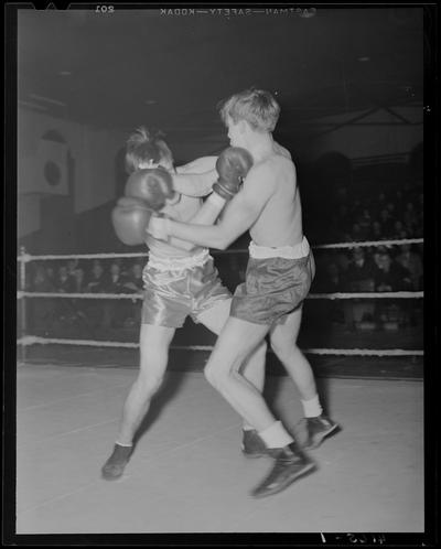 Boxing; (1939 Kentuckian) (University of Kentucky); boxing match, fighters throwing punches