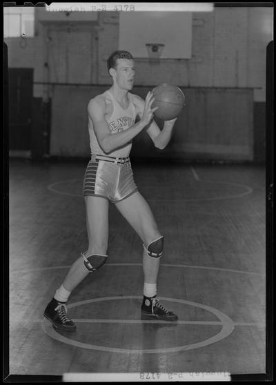 University of Kentucky varsity basketball team; individual team member on basketball court, unidentified number, Sluggish? poised to throw ball