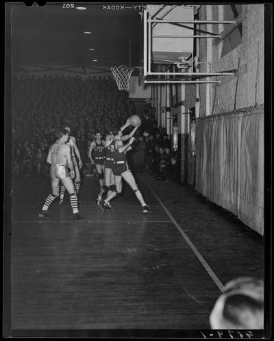 Basketball; Alabama verses Kentucky game (1939 Kentuckian) (University of Kentucky), players on court