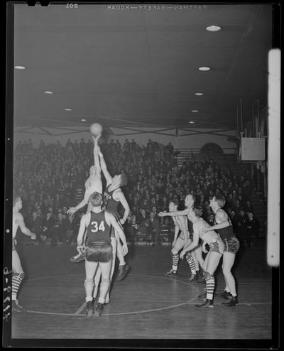 Basketball; Xavier verses Kentucky game (1939 Kentuckian) (University of Kentucky), players on court