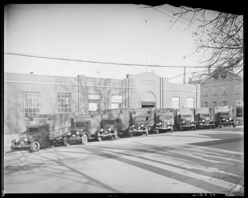 W. T. Sistrunk & Company, 601-603 West High; eight (8) trucks parked in front of company's building