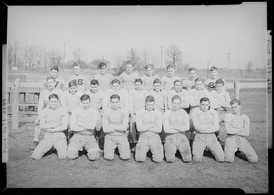 Versailles High School; Football team, team group portrait on the playing field