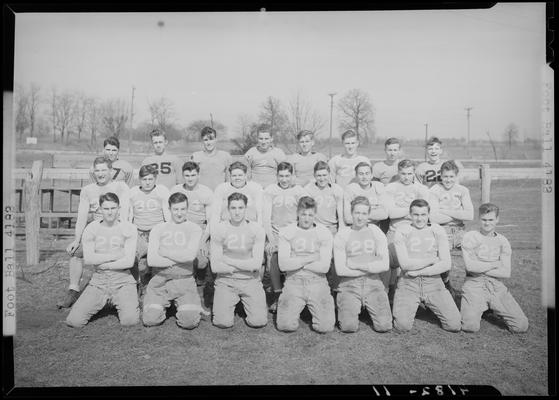 Versailles High School; Football team, team group portrait on the playing field