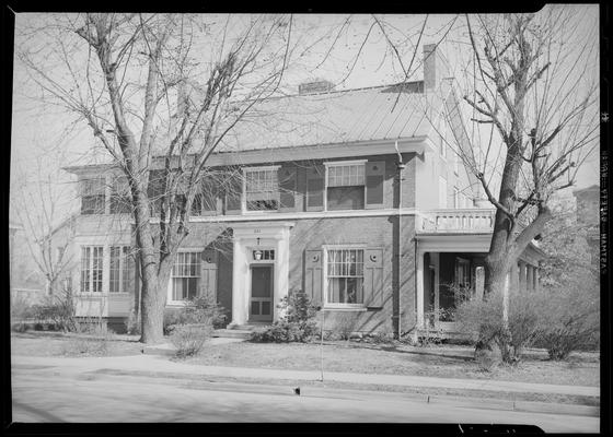 Fraternity Houses (1939 Kentuckian) (University of Kentucky); exterior front view of house and sidewalk from the street, street address 251, street unknown