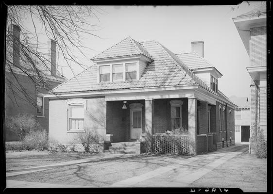 Fraternity Houses (1939 Kentuckian) (University of Kentucky); exterior front view of house, street address 415, street unknown