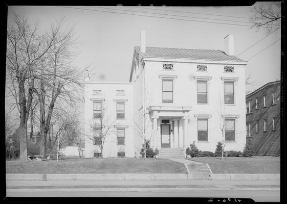 Fraternity Houses (1939 Kentuckian) (University of Kentucky); exterior front view of house and sidewalk, street address 331, street unknown