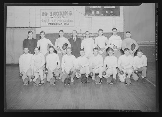 Fencing Team (1939 Kentuckian) (University of Kentucky); team group portrait on the basketball court of the gymnasium