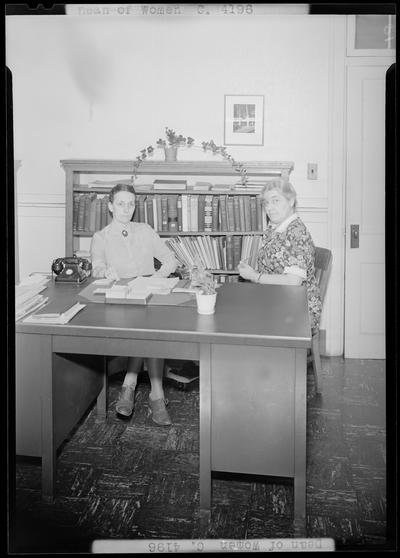 Dean of Women (1939 Kentuckian) (University of Kentucky); two (2) women sitting next to a desk