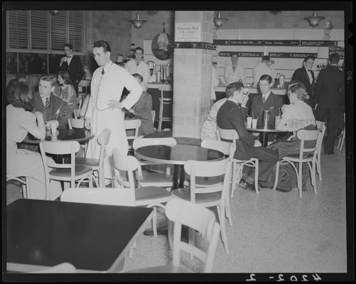 Delta Chi Dance (1939 Kentuckian) (University of Kentucky); cafe (cafeteria), men and women in formal attire