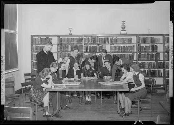 Versailles High School, Yellow Jackets; members sitting around a table in the library
