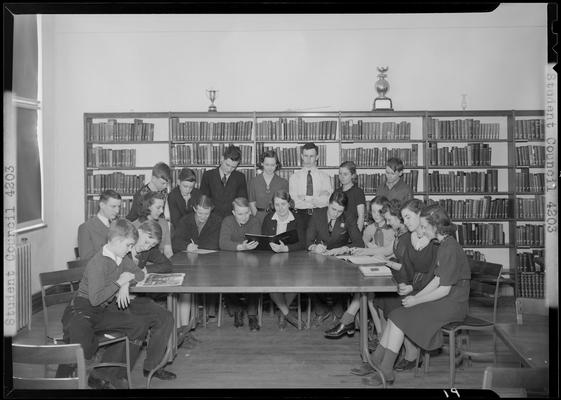 Versailles High School, Student Council; members sitting around a table in the library