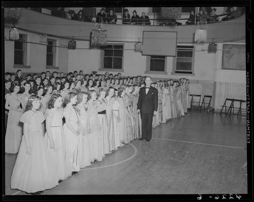 Margorie Hall; dance; girls and boys lined up on the dance floor (basketball court in the gymnasium)