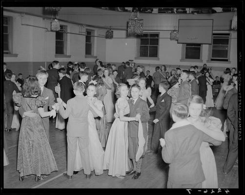 Margorie Hall; dance; girls and boys dancing on the dance floor (basketball court in the gymnasium)