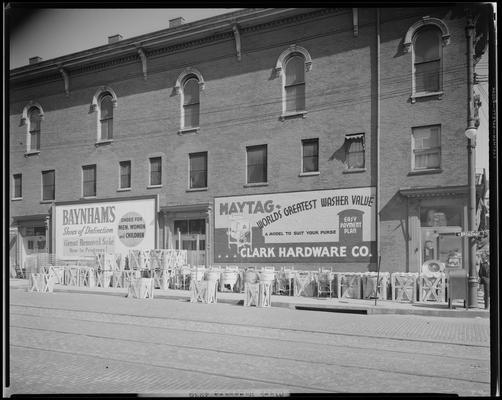 Clark Hardware Company, 367 West Short and 140 North Broadway; exterior view of store, washing machines and other merchandise displayed on the sidewalk surrounding the building