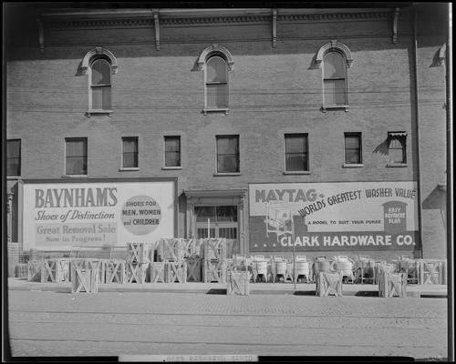 Clark Hardware Company, 367 West Short and 140 North Broadway; exterior view of store, washing machines and other merchandise displayed on the sidewalk surrounding the building