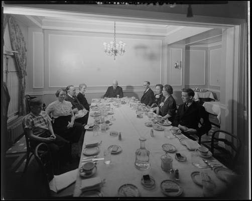Mr. C.H. Griffith; party, group sitting around a table