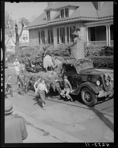 May Day Parade & Festivities (1939 Kentuckian) (University of Kentucky); group of young boys gathered around parade float