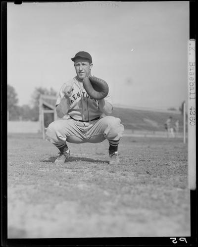 University of Kentucky Baseball, (1940 Kentuckian) (University of Kentucky); individual player, catcher with mitt (glove) squatting in position