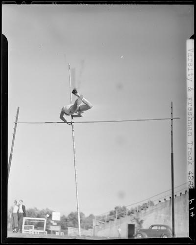 University of Kentucky Varsity and Freshman track team, (1940 Kentuckian) (University of Kentucky); individual member performing the pole vault
