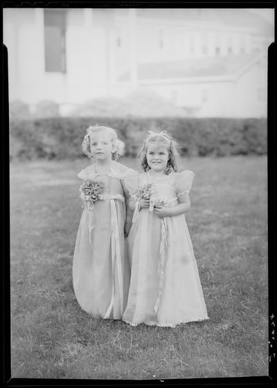 Saint Joseph Hospital, 544 West Second (2nd) Street; outdoors, nurses' graduation, two young girls in formal attire holding bouquets