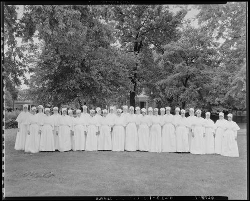 St. Joseph's Hospital, 544 West Second (2nd) Street; group portrait, large group of sisters (nuns) standing outside on the grass (lawn)