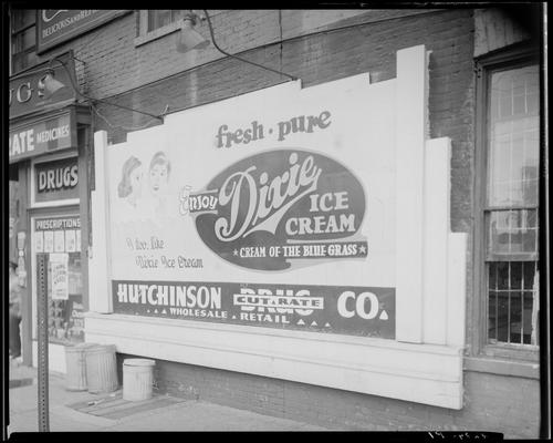 Dixie Ice Cream Company, 123 Rose Street (corner of Chesapeake); exterior view of Dixie Ice Cream Company sign and Hutchinson Drug Company sign