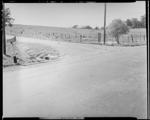 Winganeek Farm & wrecked truck; post accident scene photographs; roadway intersection U.S route 25; mailbox along side of road reads 