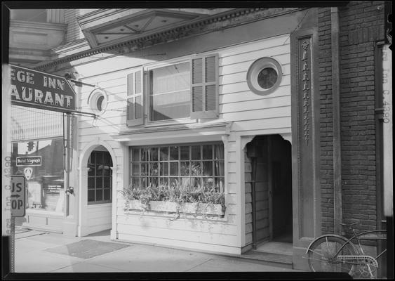 College Inn Restaurant, 207 East Main; exterior view of window display, entrance, and sign