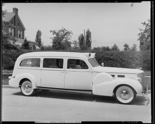 Kerr Brothers Funeral Home, 465 East Main; car (ambulance), side view