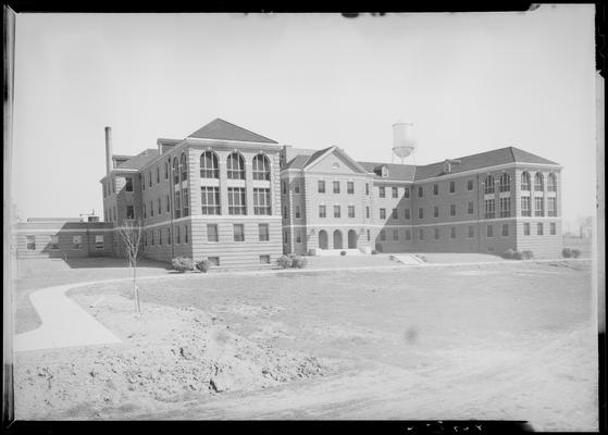 Veterans Hospital; exterior view of building, water tower seen in the background