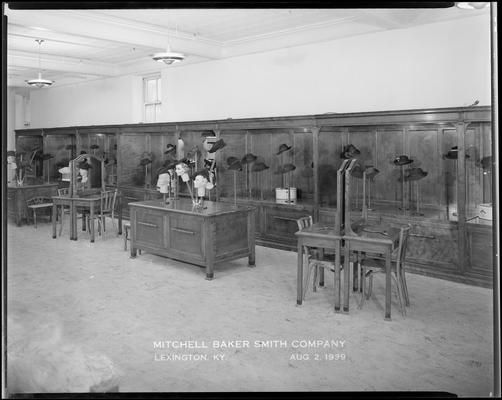 Mitchell, Baker & Smith Company, department store; 230-232 West Main; interior, millinery displays and tables for trying on products (hats)