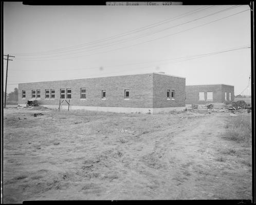 J. Fred Beggs & Sons, contractors (construction); Narcotic Farm, brick building under construction