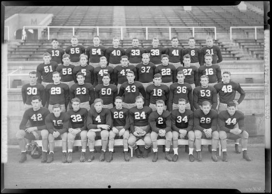 University of Kentucky; varsity football squad, team group portrait, members sitting on the bleachers