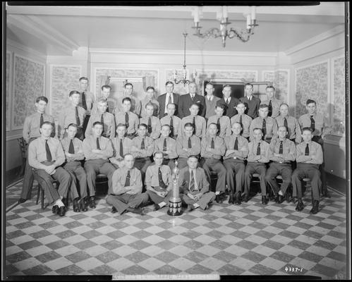 Southeastern Greyhound Lines; drivers (bus) group portrait with trophy (award)