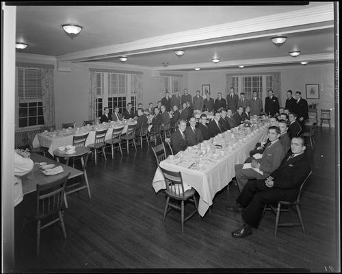 Delta Chi; Fraternity Banquet; men gathered around banquet tables