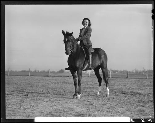 Annette Klingholz (1940 Kentuckian) (University of Kentucky); Annette Klingholz sitting atop a horse