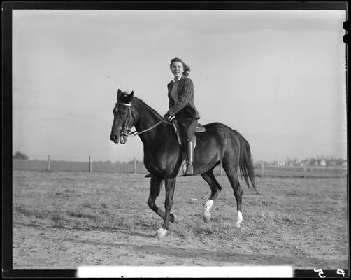Annette Klingholz (1940 Kentuckian) (University of Kentucky); Annette Klingholz riding a horse