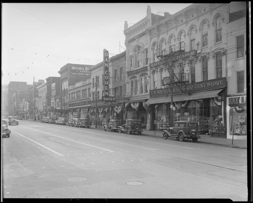 Main Street, looking east from Mill Street; Schulte-United, 236-246 West Main (department store); S.S. Kresge Co., 250-254 West Main; Dan Cohen Shoes, 258 West Main; B B Smith and Co., 264 West Main; F.W. Woolworth, 268-274 West Main