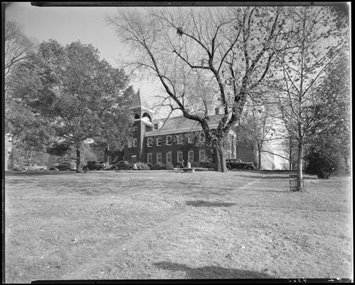 Campus scenes; Engineering Building (1940 Kentuckian) (University of Kentucky); exterior view of building, landscape, and cars parked in front of building